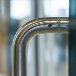 U-Shaded door handle on a glass sliding door