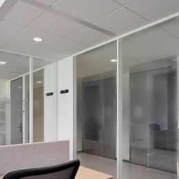 Glass and steel panels combined in a partition 