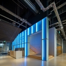 Blue light behind the IQ-Single glass wall at Pulse Delft