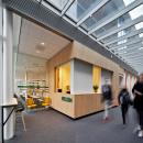 Entrance / reception with left glass wall view to canteen Seeligkazerne Breda