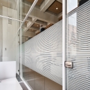 Glass partition with full glass door