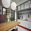 Kitchen with pantry built into IQ-Pro glass wall