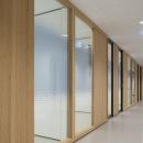 Corridor with closed partition and aluminum frames doors 
