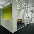 Full glass office walls combined with cabinets