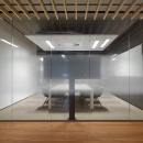 Single glass office wall with design foil added