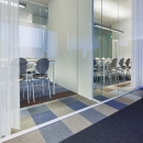 Single glass partition and closed wall