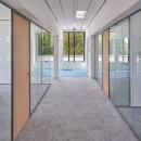 Corridor with glass partitions on both sides