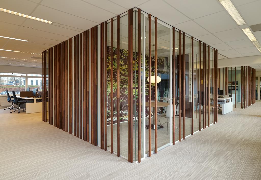 Wood construction on the glass of a office partition