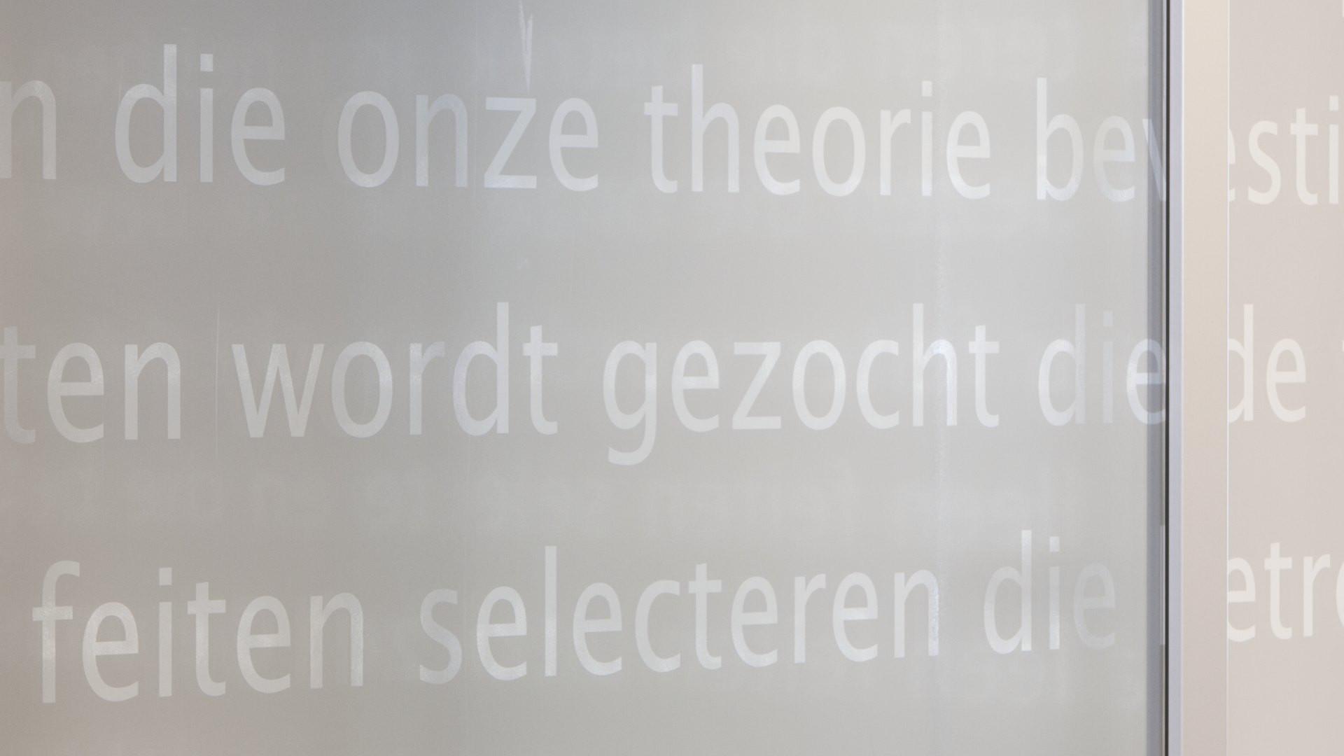 Closeup text design foil on glass wall