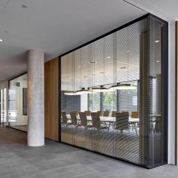 Double glass partition wall with blinds between the glass