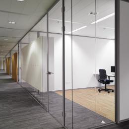 Glass wall with integrated cabinets