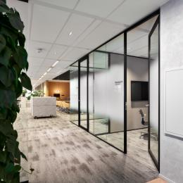 Glass partitions with framed doors