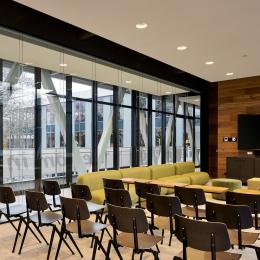 Within a meeting room with Glass partition walls of QbiQ 