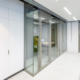 Corridor with glass partitions