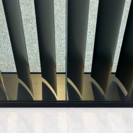A close up of a profile with blinds inside