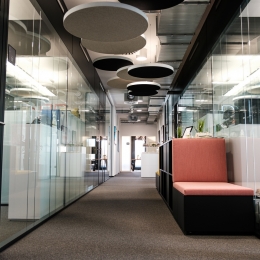 Hallway with glass partitions on both sides