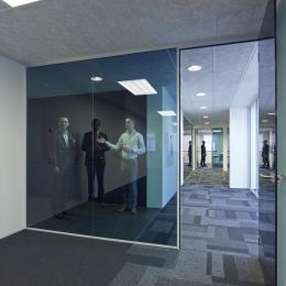 Blue colored glass and doors partitions walls