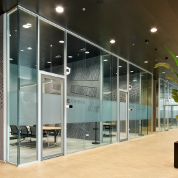 4 meter high full glass partitions with full flush doors