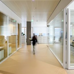 Double glass partitions with wall thick doors.